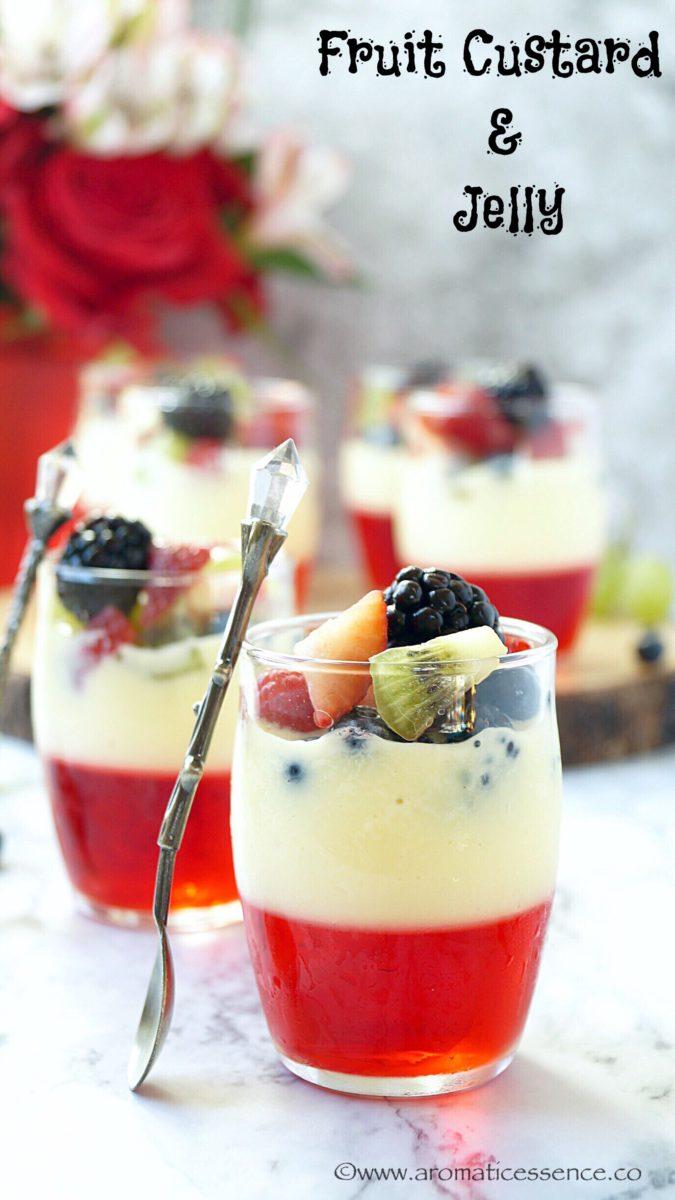 Close-up of layers of guava jelly, custard, and berries in a glass dessert bowl