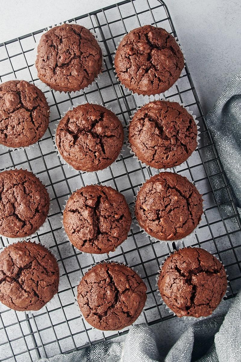A batch of freshly baked brownies cooling on a wire rack