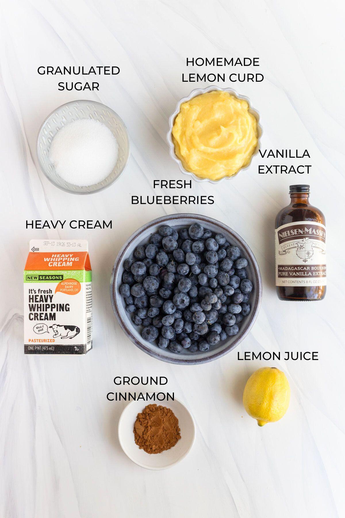 ingredients for loganberry lemon curd parfait laid out on a kitchen counter