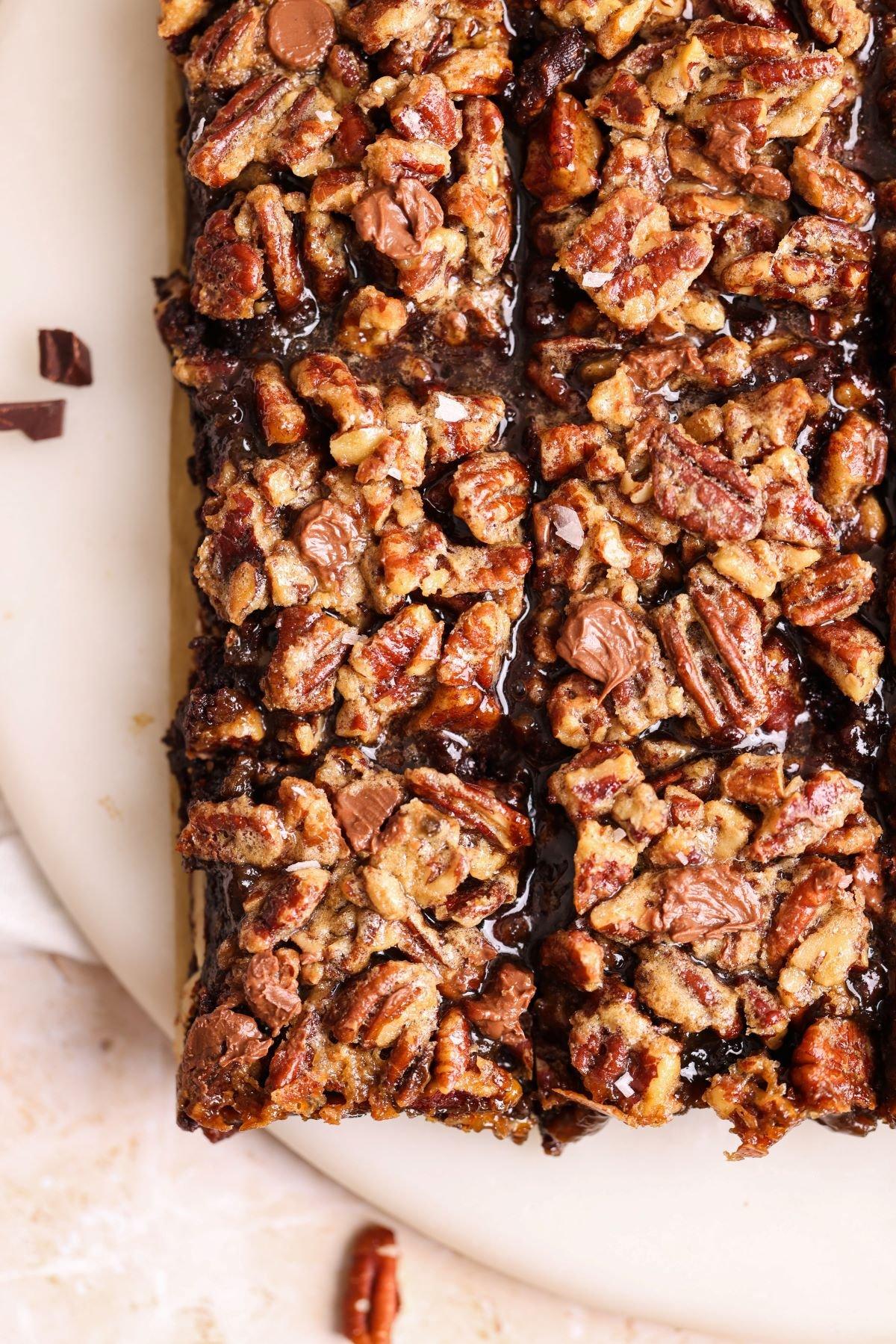 close up shot of vegan bourbon pecan brownies