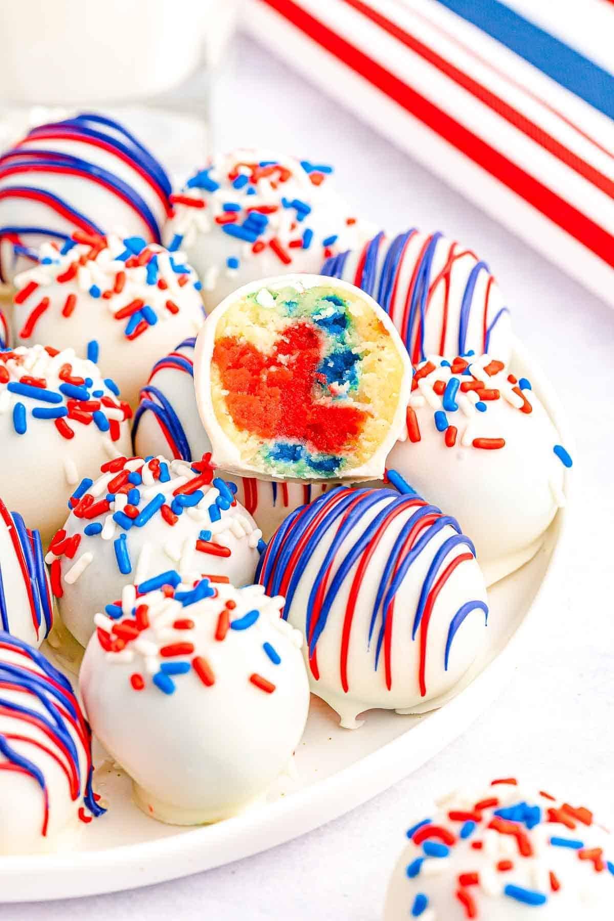 patriotic cake pops decorated with red, white, and blue sprinkles