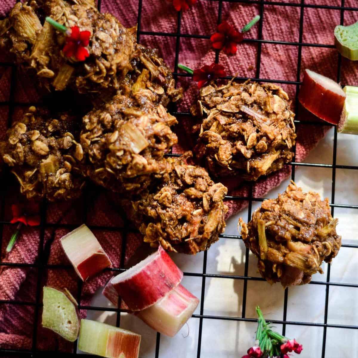 A batch of rhubarb chocolate hazelnut cookies cooling on a wire rack
