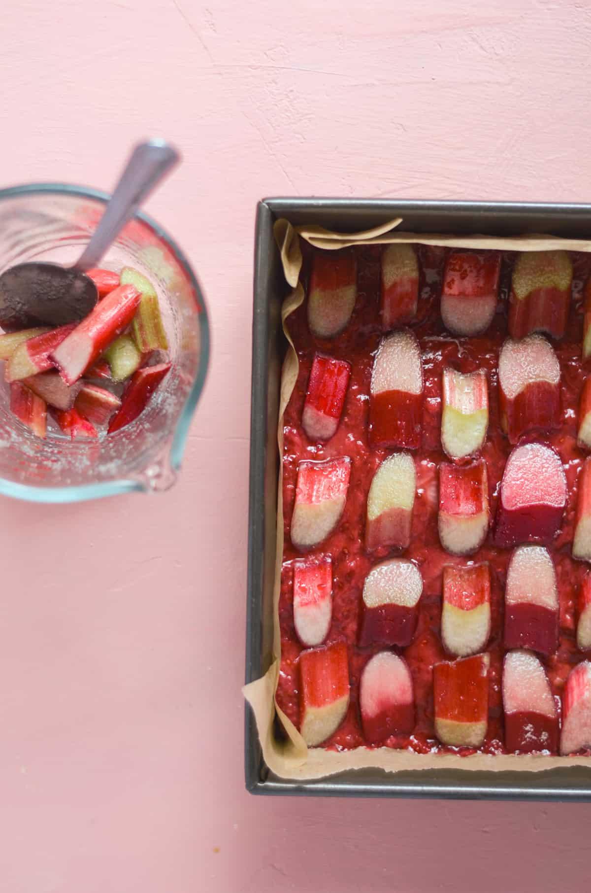 slice of quince rhubarb bar being lifted from a tray