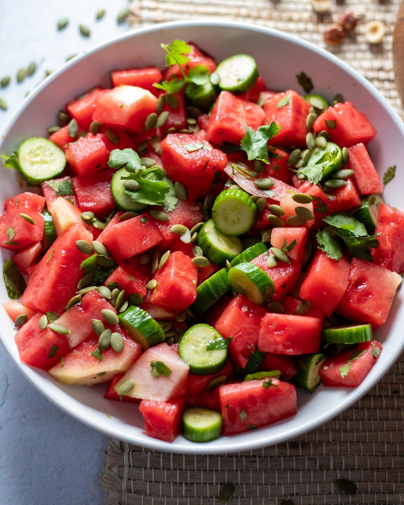 close-up of watermelon cucumber pasta salad in a bowl