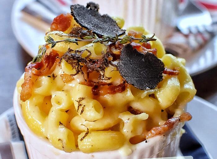 creamy black truffle mac and cheese with golden crust