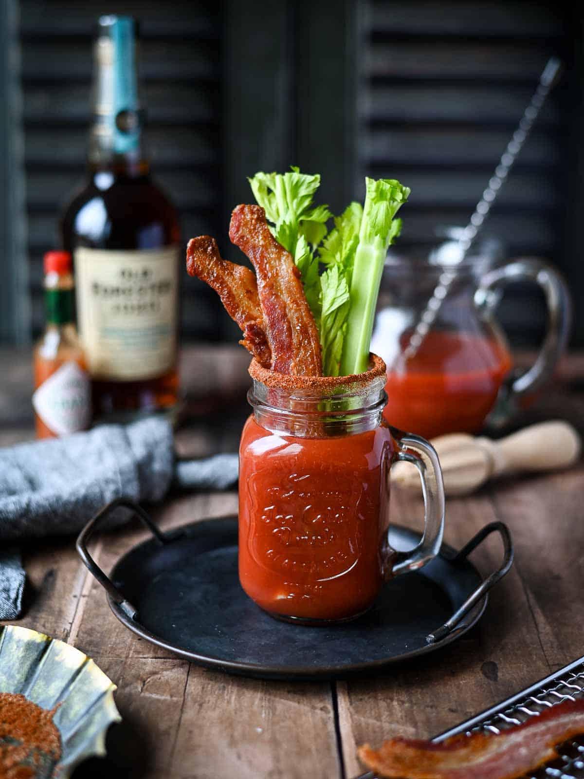top down view of two glasses of bacon and date smoothie with garnish
