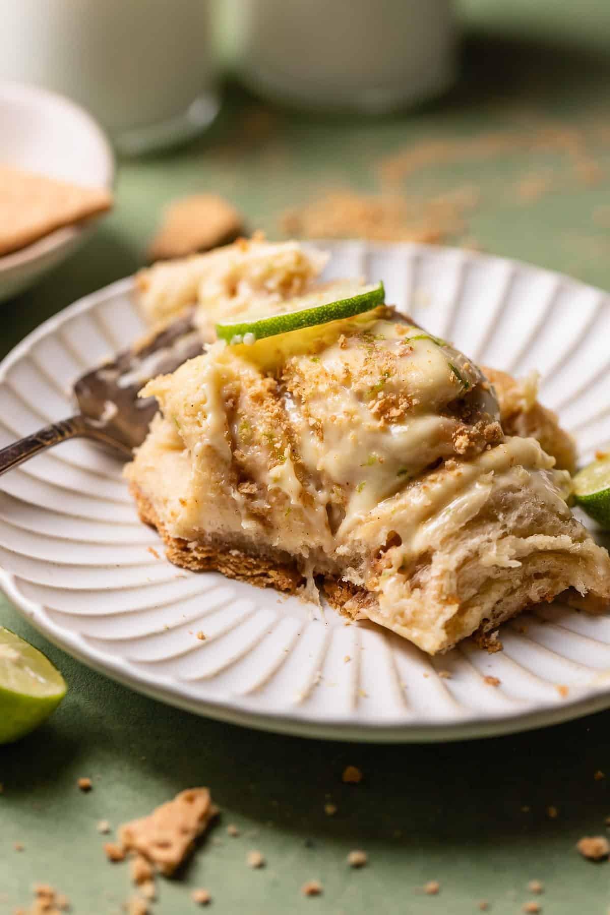 Key lime pie spring rolls plated with lime zest