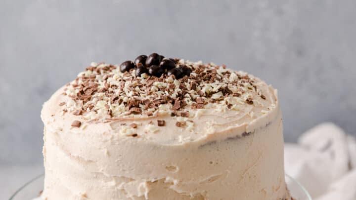 whole chocolate irish cream coffee kiss cake decorated with coffee beans