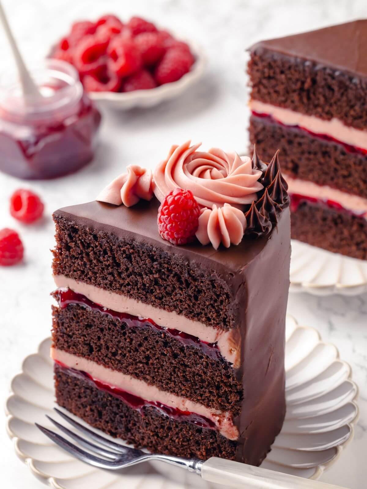 close-up of a slice of chocolate strawberry layer cake with visible layers