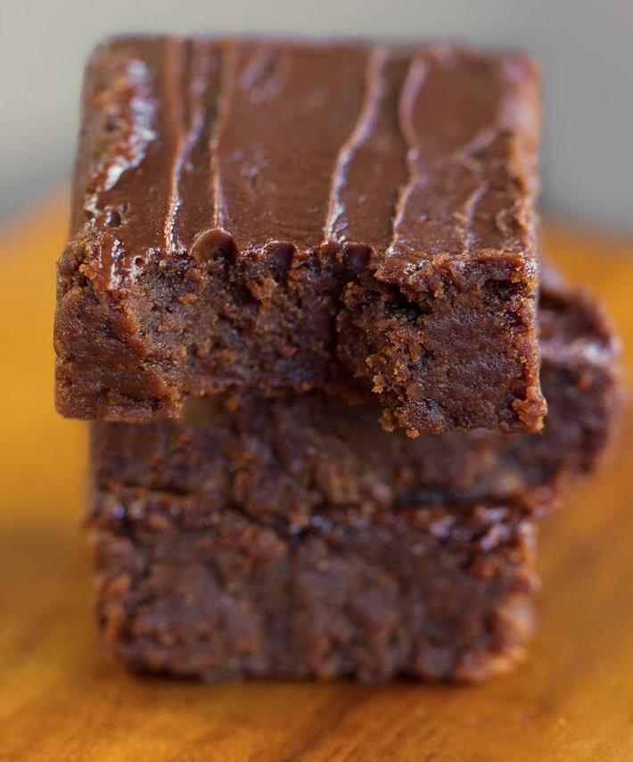 vegan brownies with purple sweet potato on a wooden board