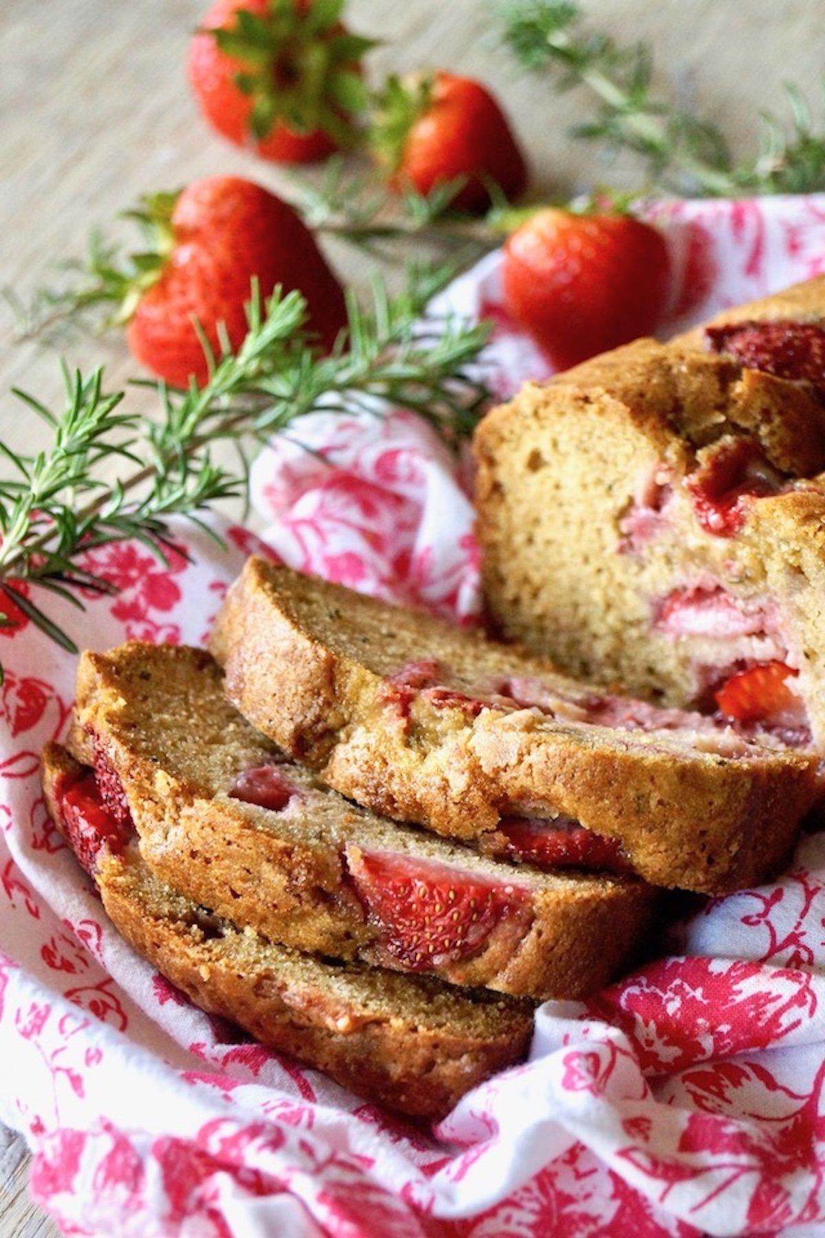 slices of strawberry rosemary cake on a plate