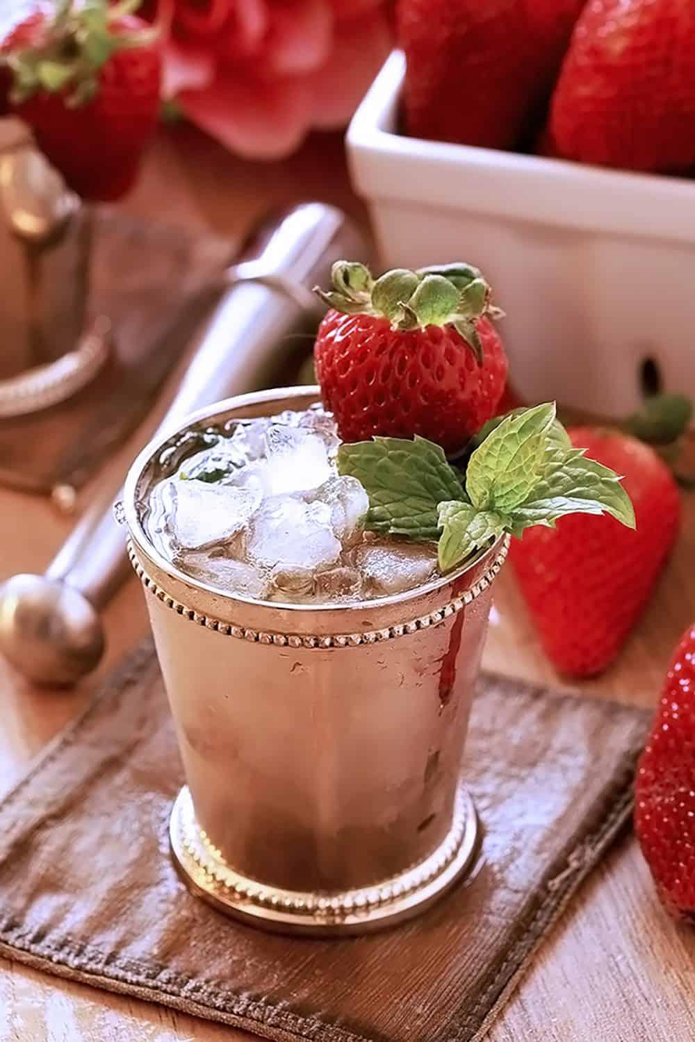 pitcher of strawberry mint oatmeal julep with ice