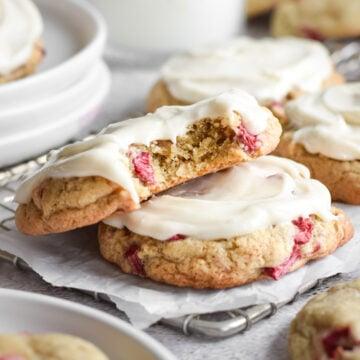 Rhubarb poppyseed cookies on a cooling rack, rustic background