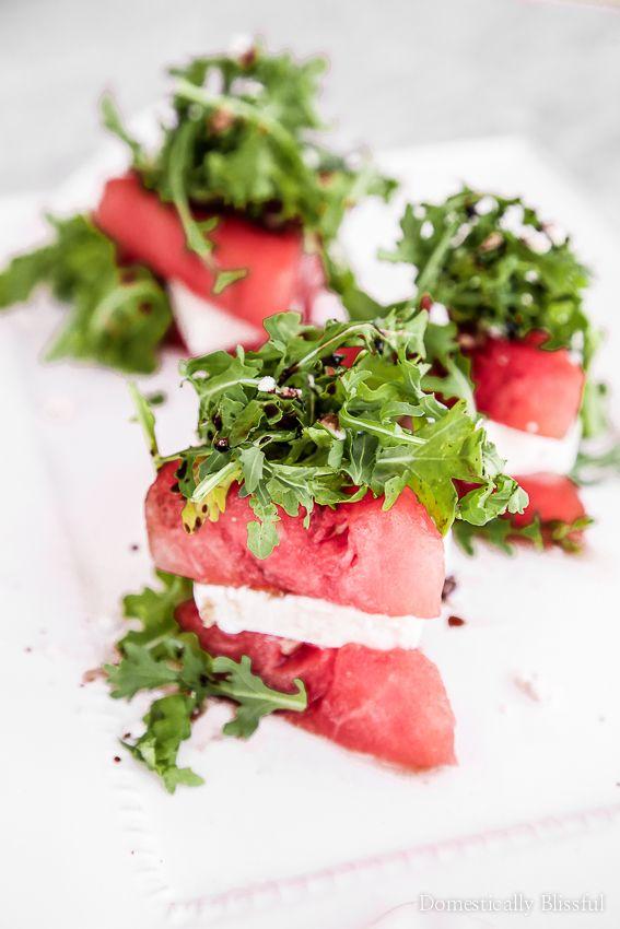 a summer barbecue with watermelon salad as part of the spread