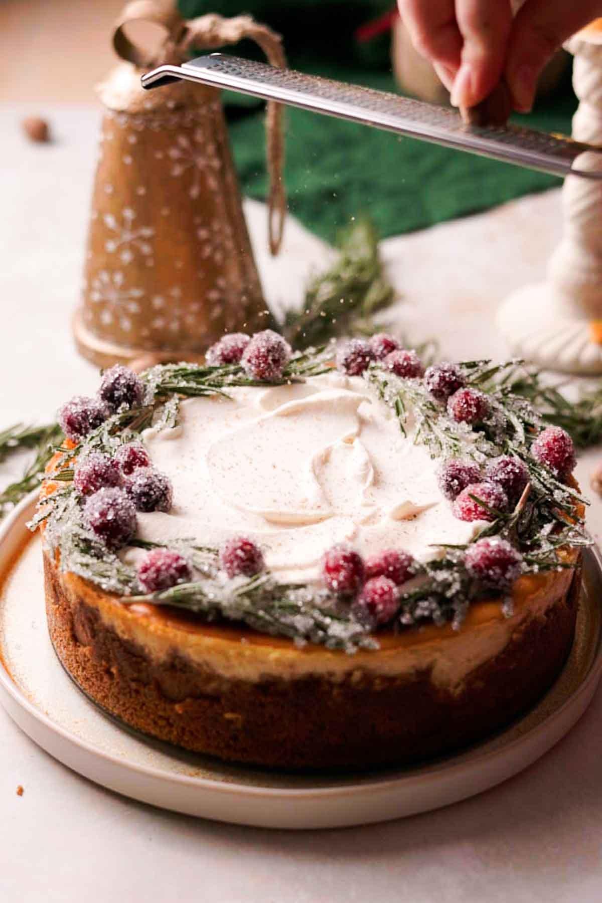 festive holiday table setting with eggnog cheesecake as the centerpiece