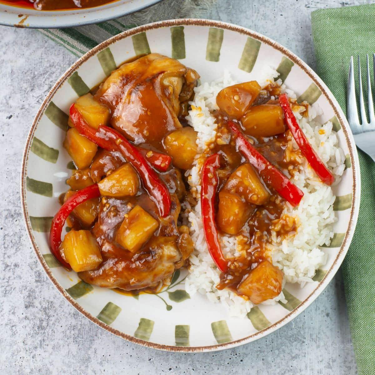 Close-up of Hawaiian BBQ chicken being mixed in a bowl
