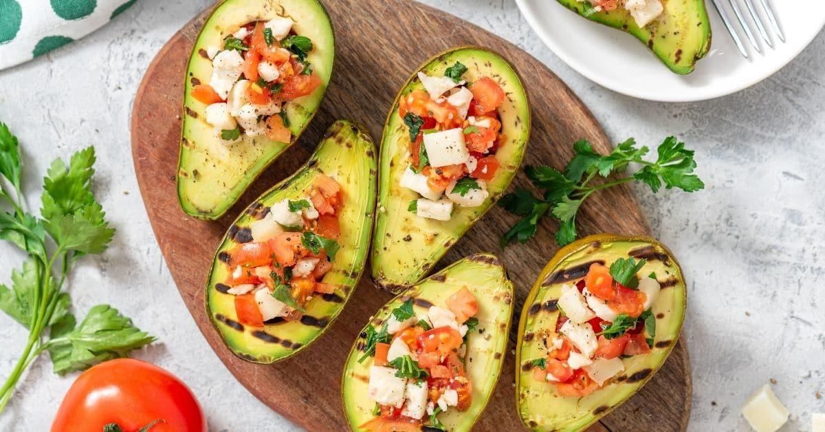 grilled avocado halves topped with lime and cilantro