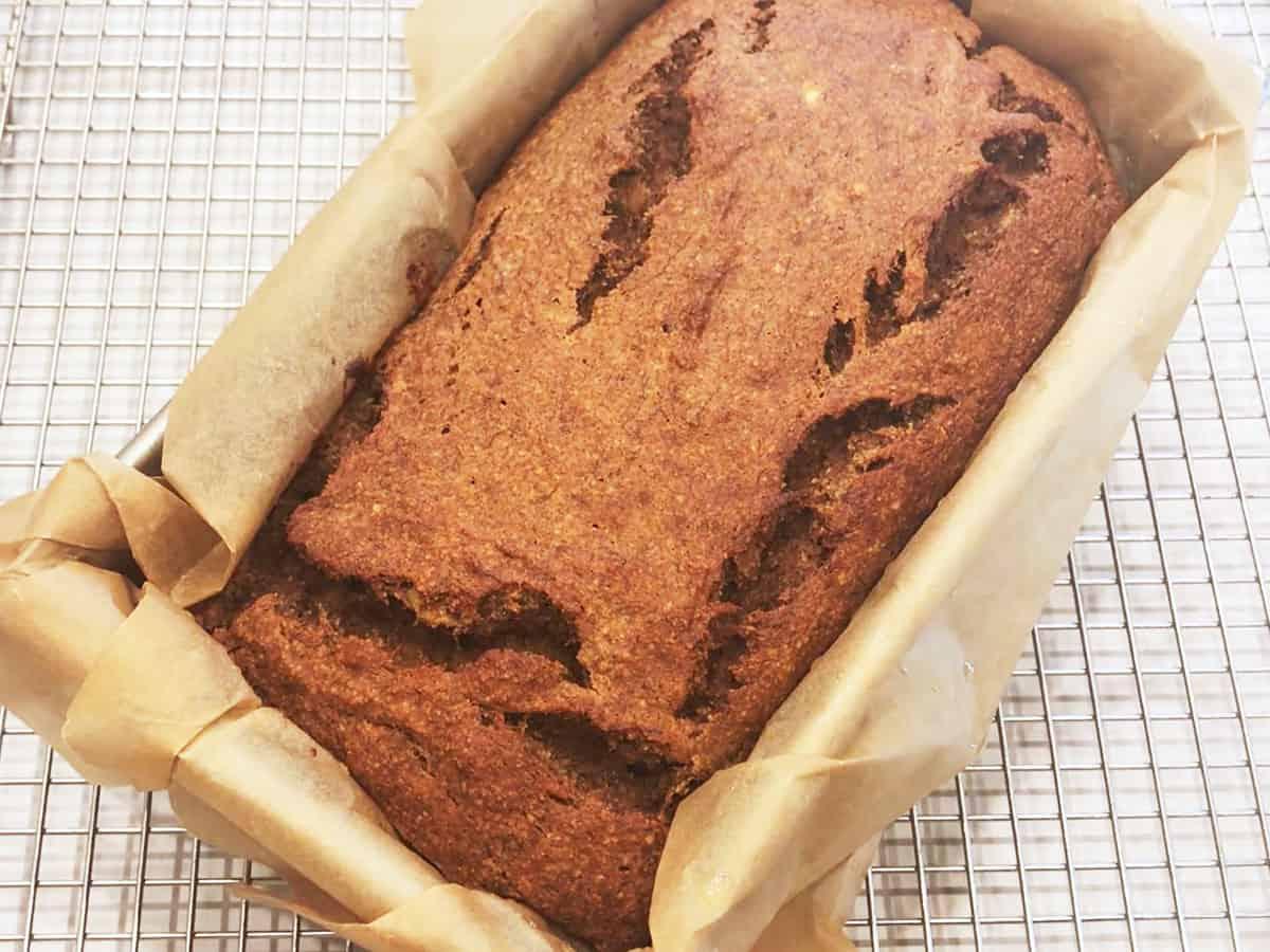 freshly baked keto banana bread cooling on a wire rack