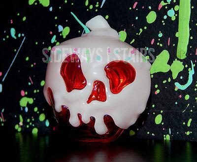 close-up shot of the tart crust with red apple juice seeping into it, creating a 'bleeding heart' effect