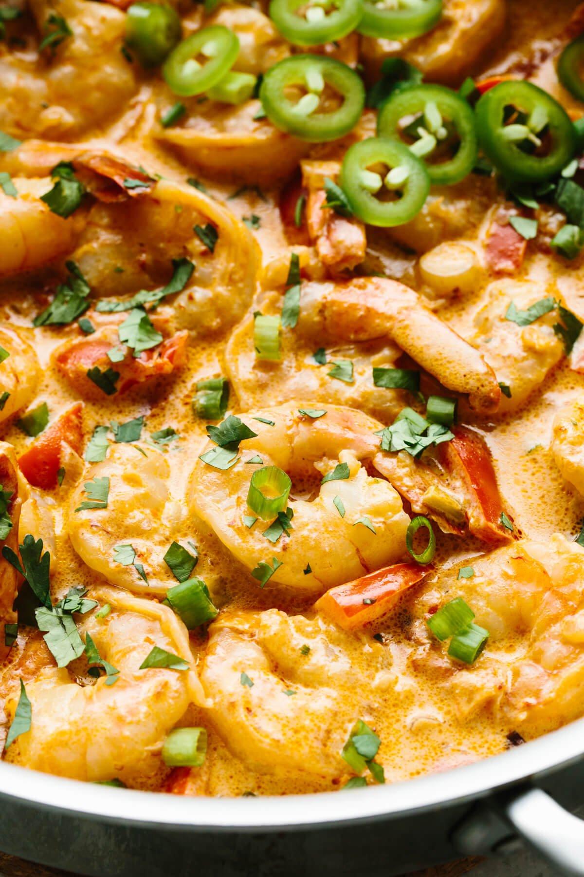 Close-up of chipotle shrimp being sautéed in a pan