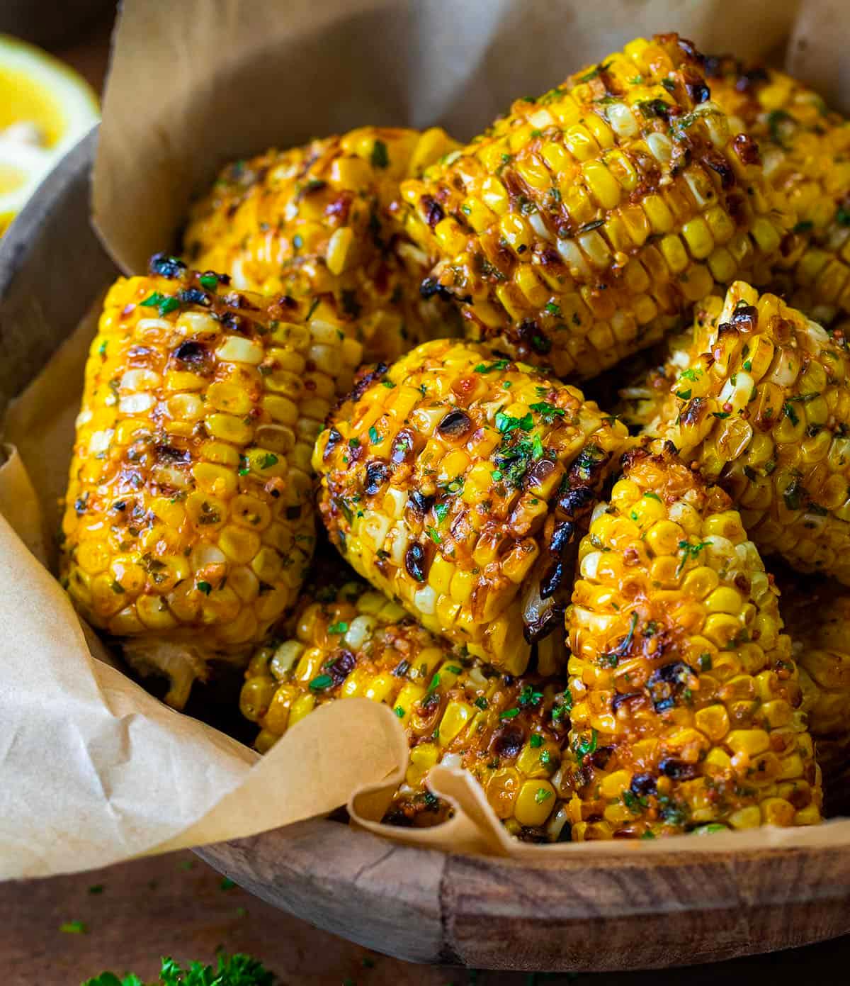 close up of grilled corn kernels with melted butter