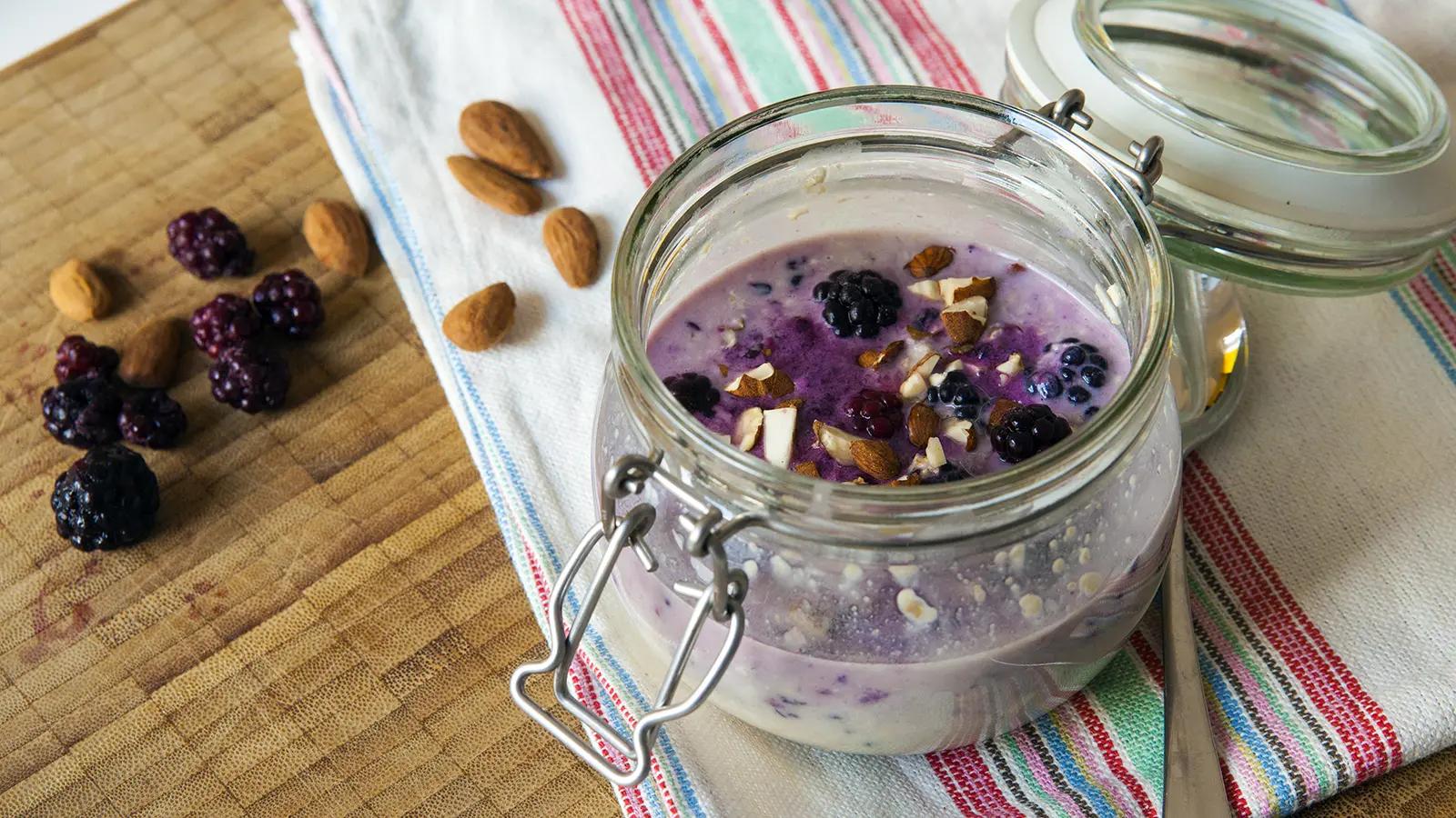 Blackberry Crumble Overnight Oats served in a glass jar