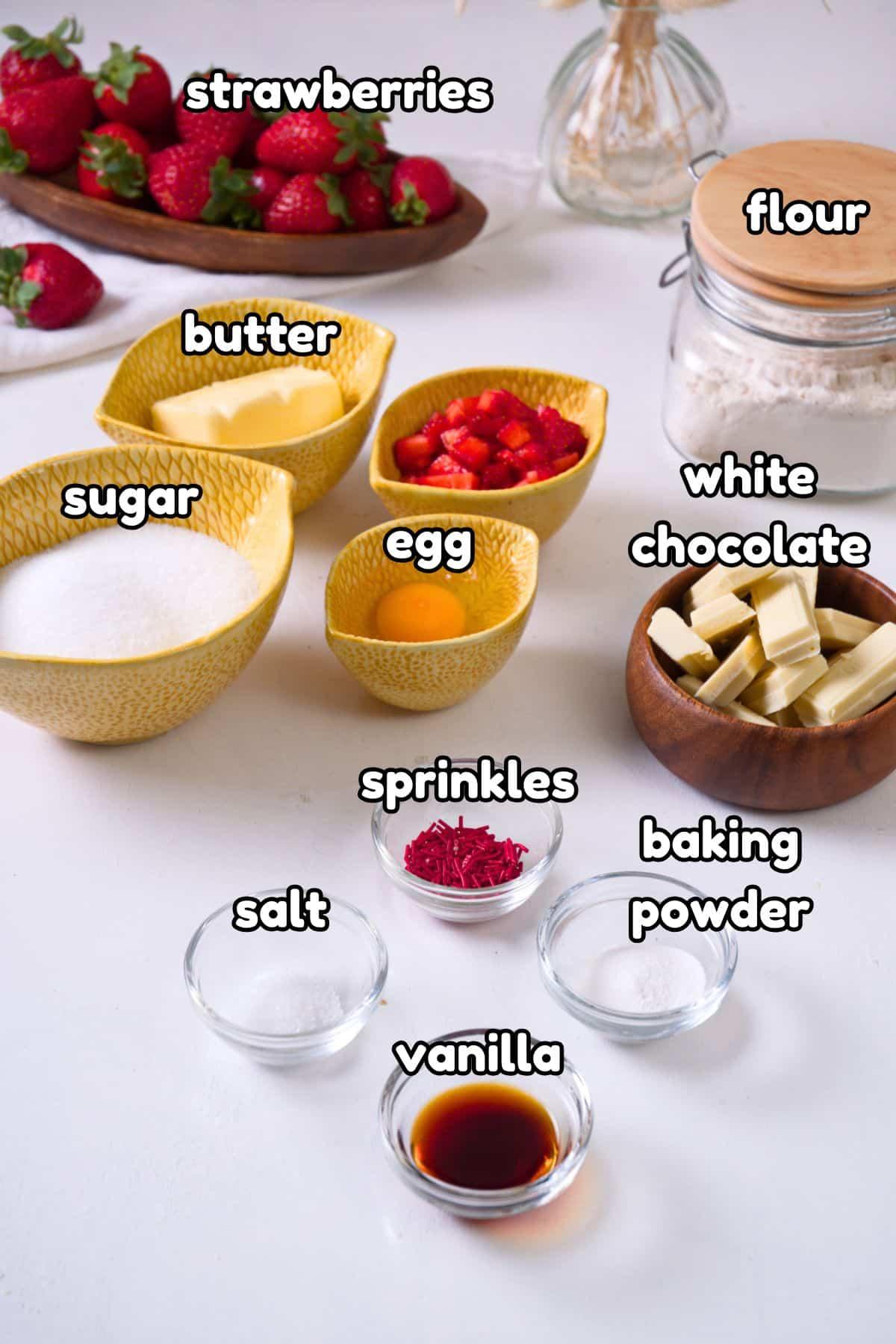 Ingredients for Frozen Strawberry Shortcake Pops laid out on a kitchen counter