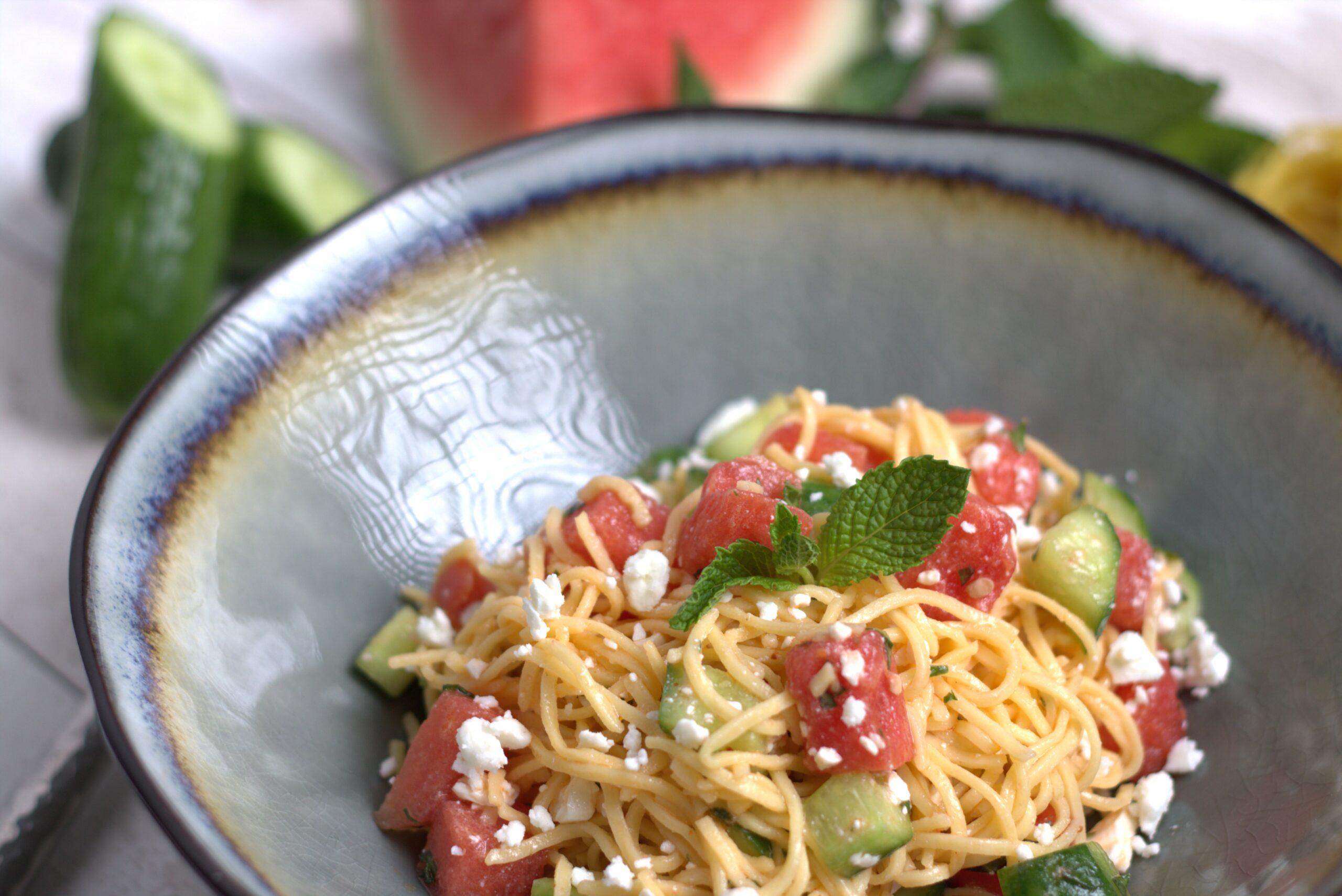 Close-up shot of the Hawaiian watermelon cucumber pasta salad showcasing the textures and ingredients