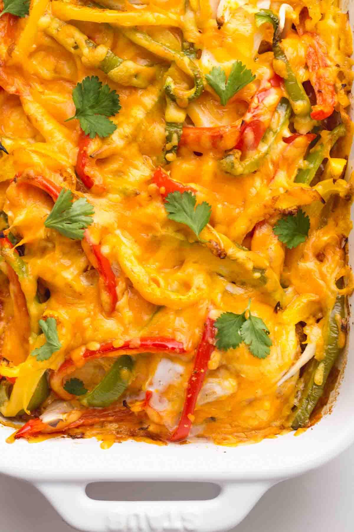 close-up of cheesy chicken fajita casserole being served