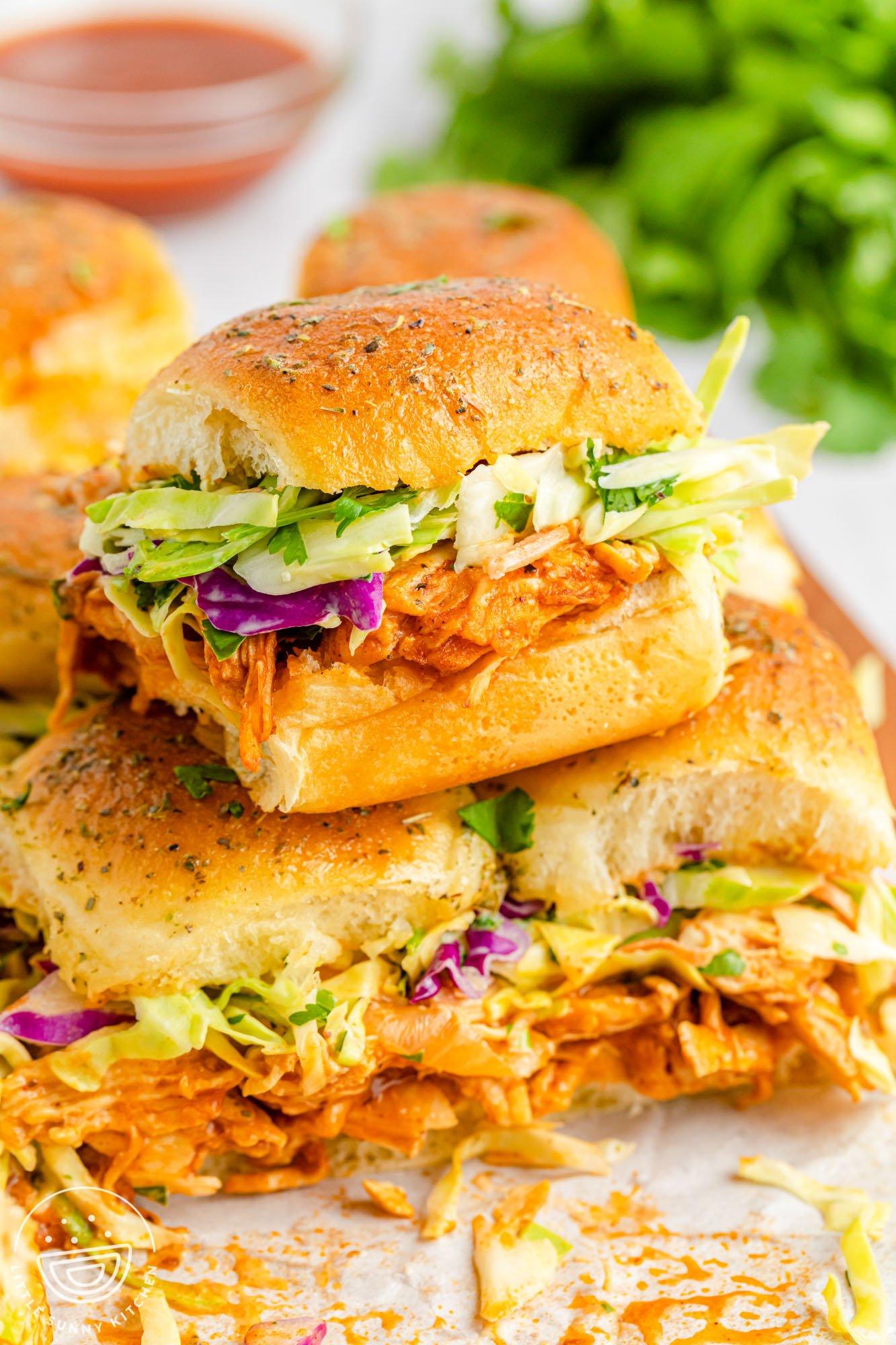 assembled hatch chili bbq chicken sliders with various toppings