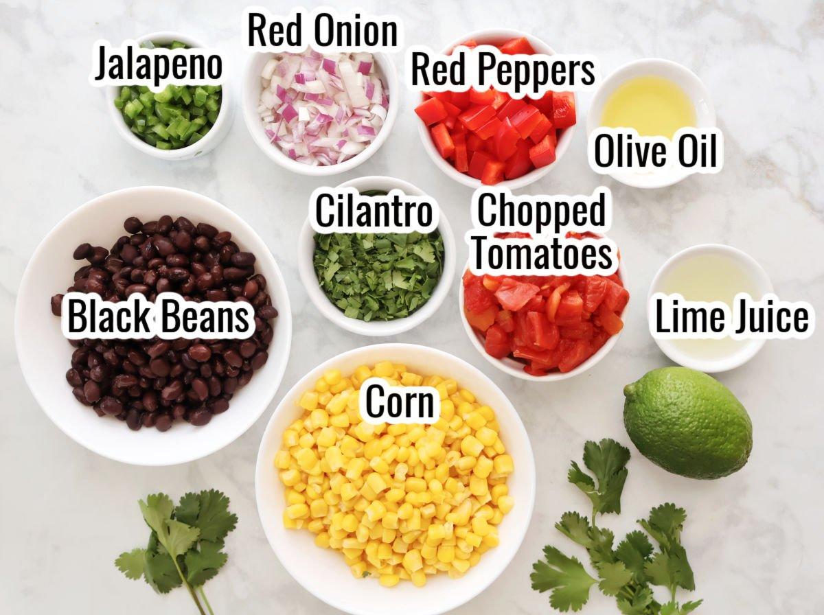 ingredients for black bean corn salsa laid out on a counter