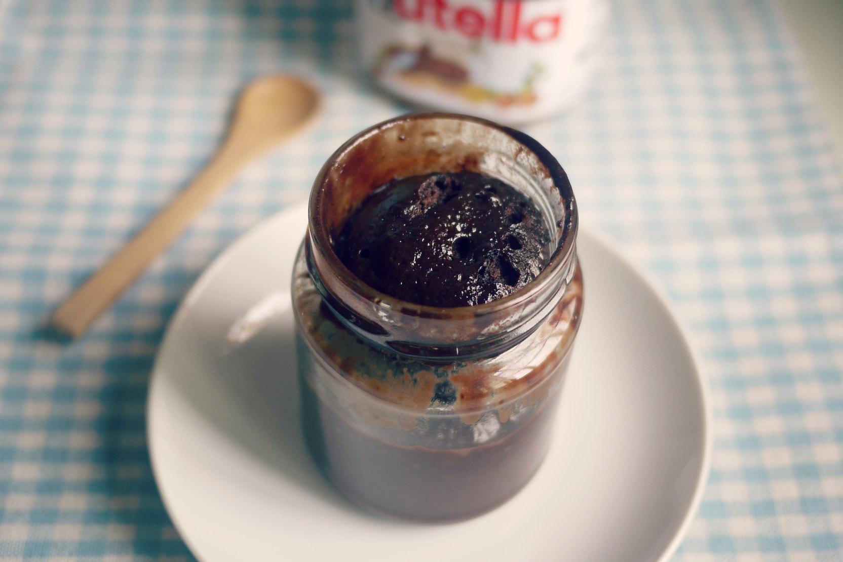 Nutella jar with a spoon and cake batter