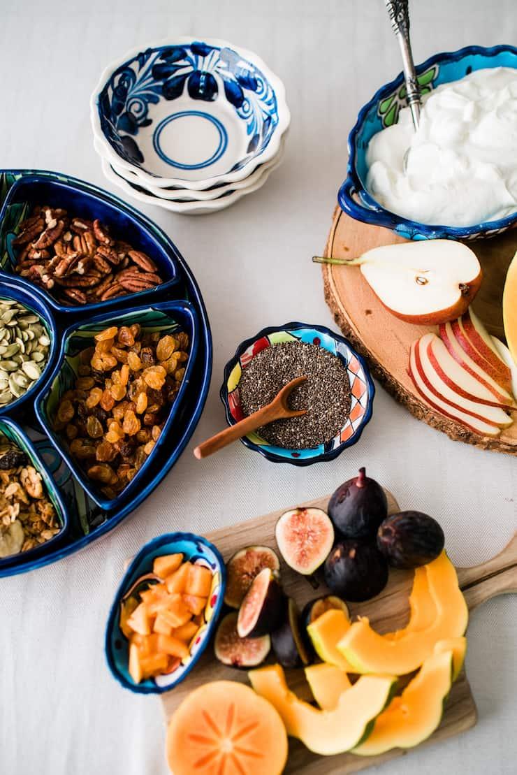 Overhead shot of a completed Garlic Rice Yogurt Parfait with various toppings