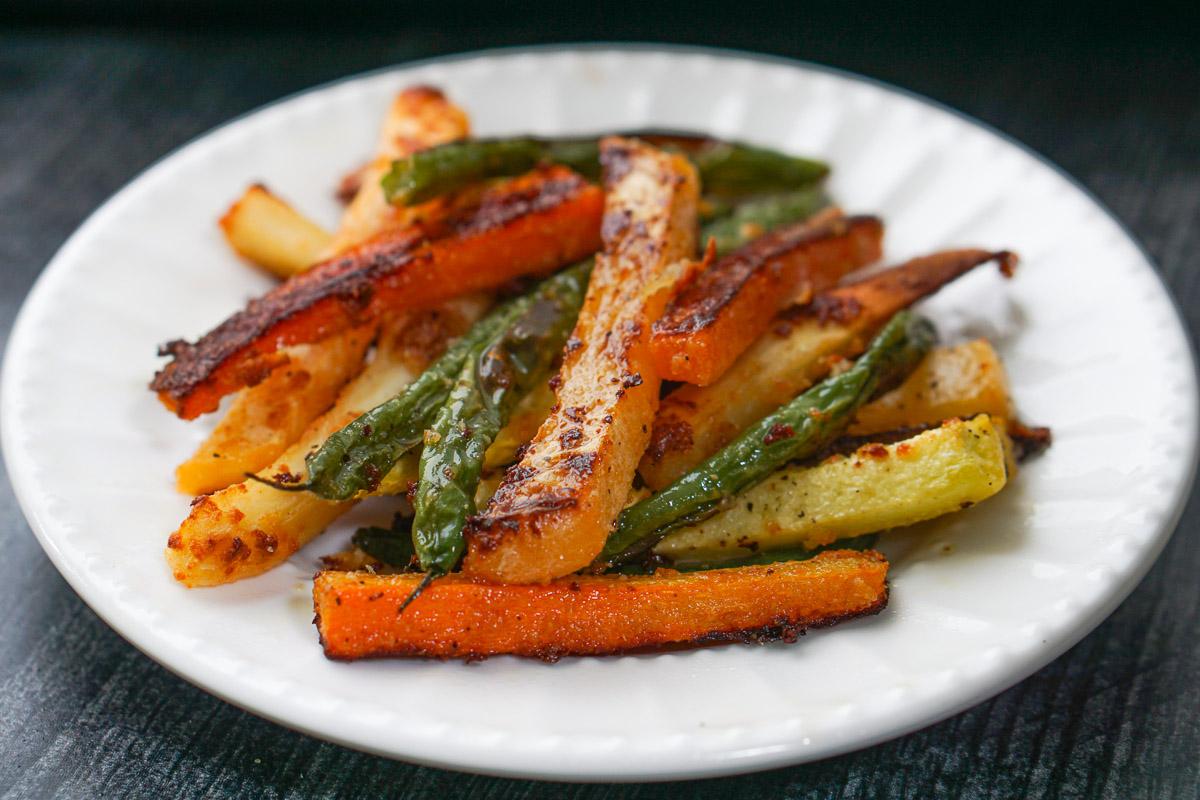 close up shot of vegetable fries in a frying pan