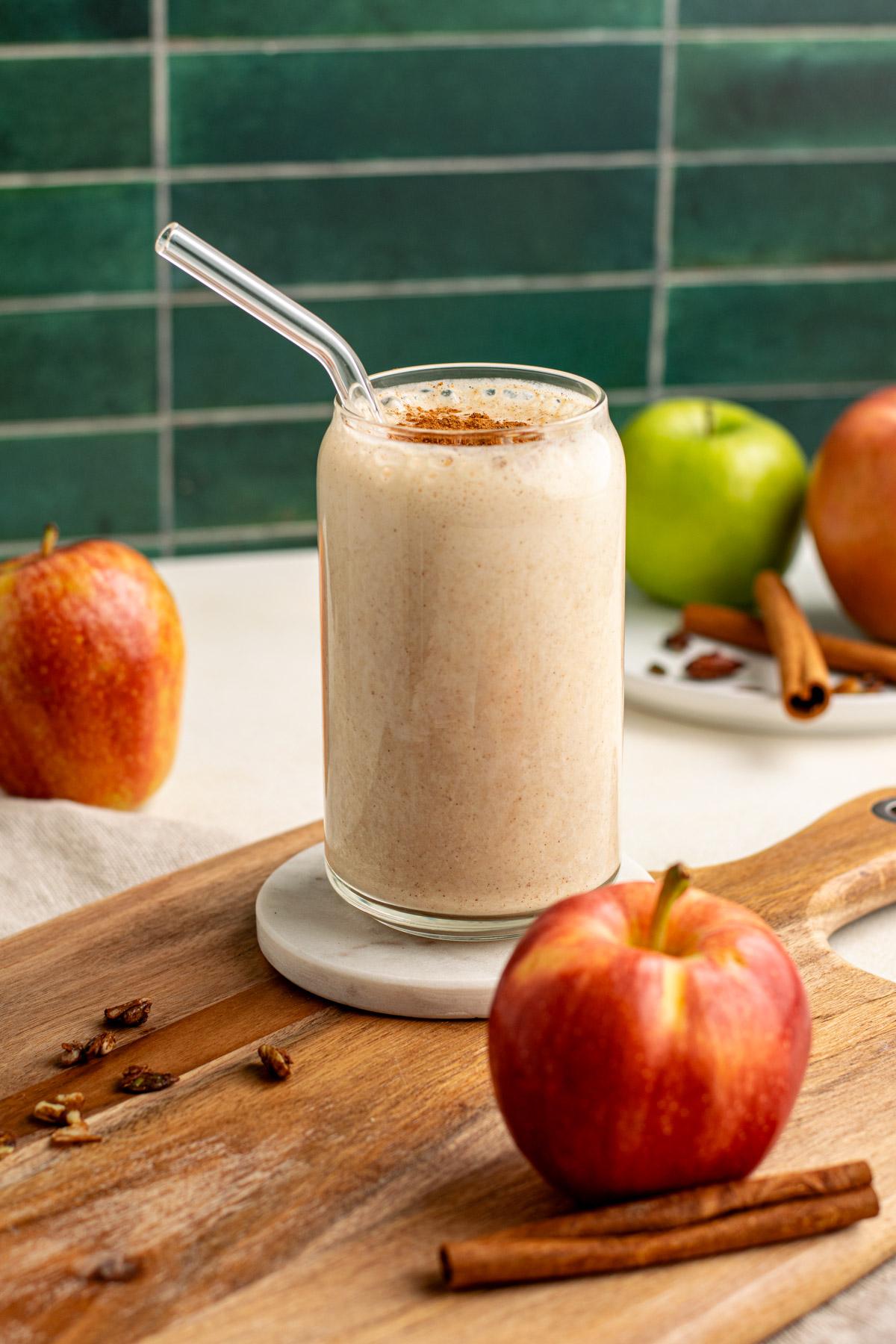 a close-up shot of blending spiced apple protein smoothie in a high-speed blender