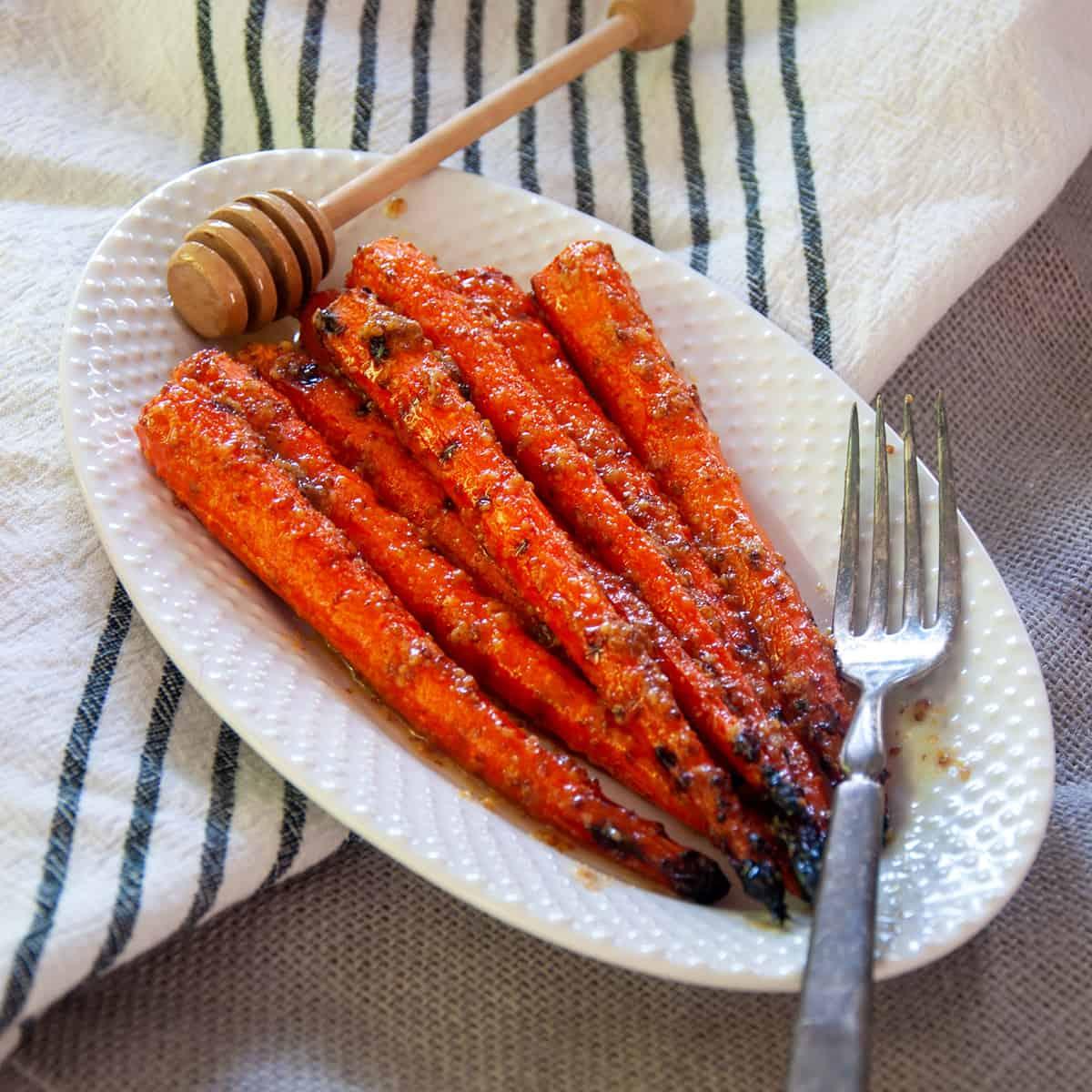 plate of vibrant honey mustard roasted carrots