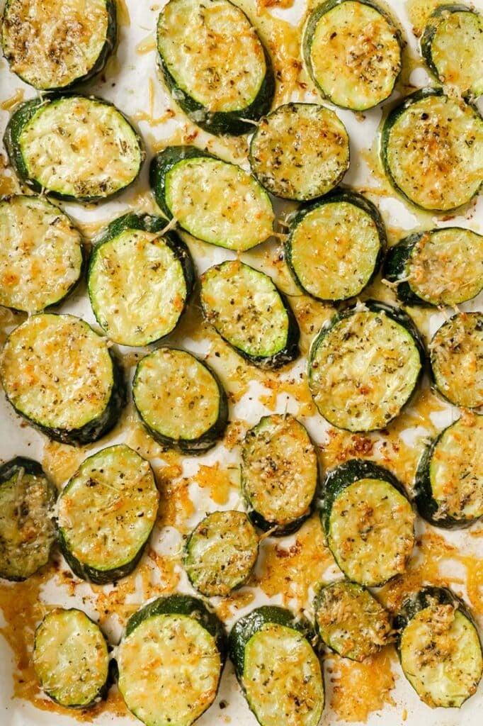 close up shot of slicing zucchini for the bake