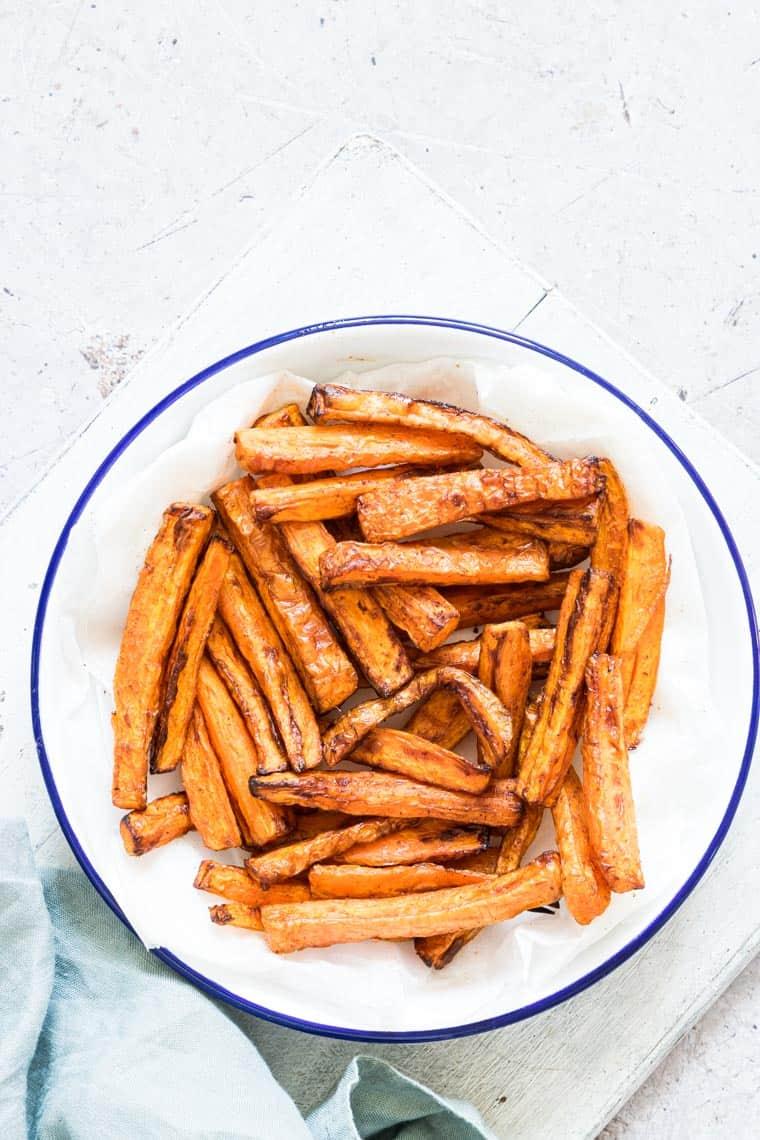 close up of cinnamon sugar carrot fries on a plate