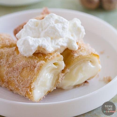 golden brown eggnog empanadas with rum glaze, dusted with nutmeg