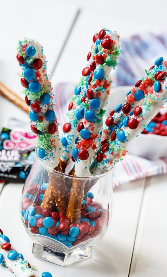 melting candy melts in a double boiler for firecracker pretzel bites