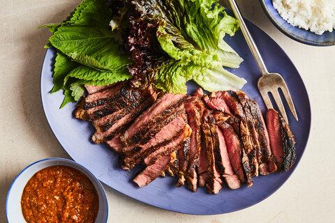 raw flank steak marinating in korean bbq sauce