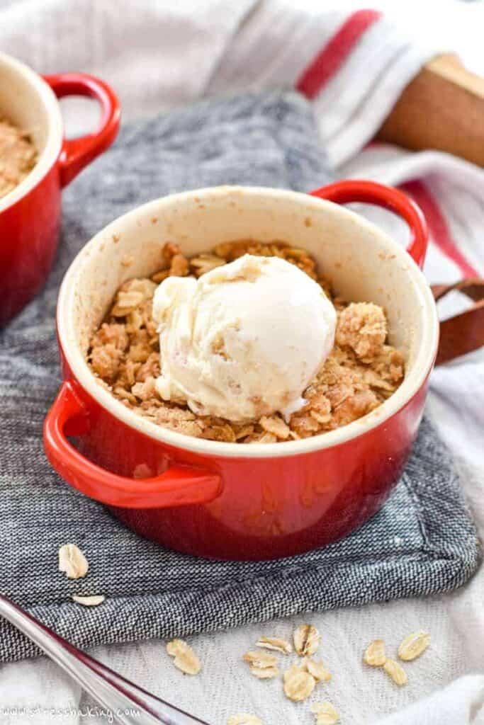 close-up of a freshly baked apple crisp for two in a ramekin