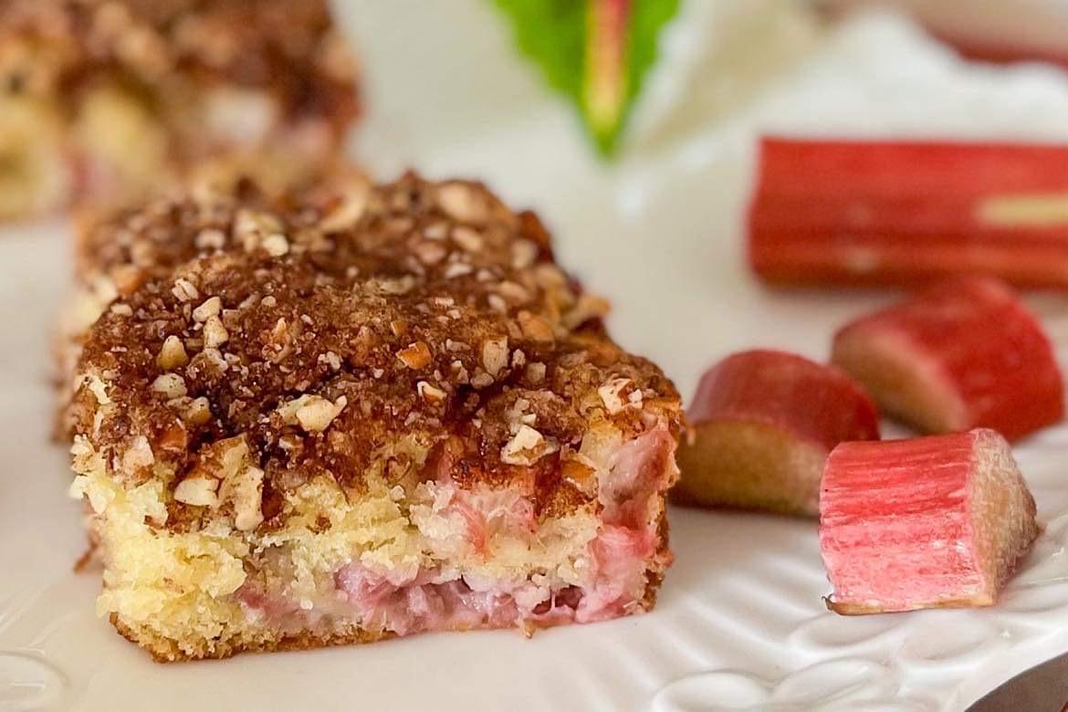 close up of a freshly baked rhubarb and walnut cake