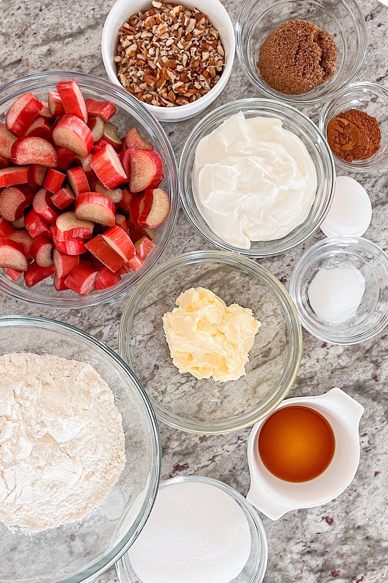 overhead shot of ingredients laid out for rhubarb and walnut cake
