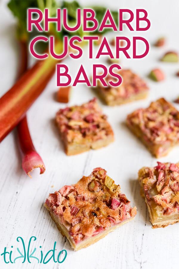 maple rhubarb custard bars on a rustic wooden surface