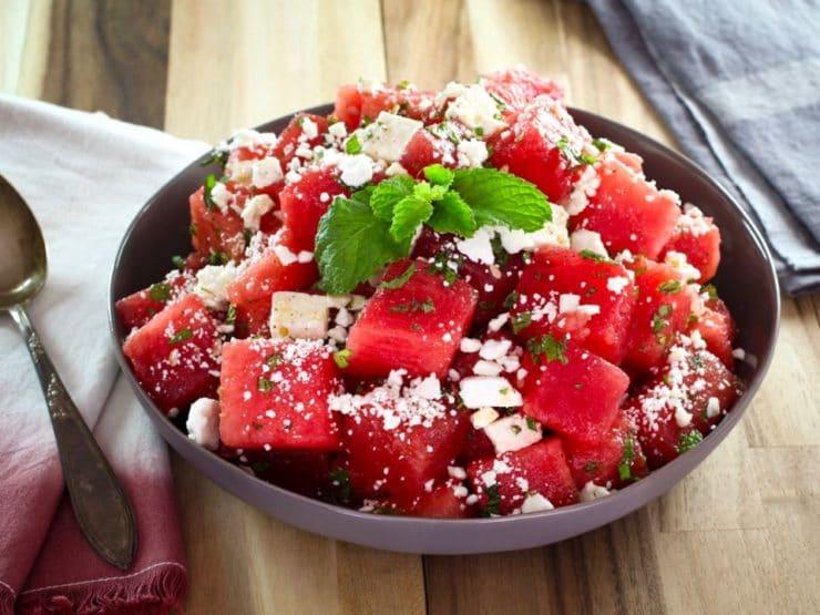 individual serving of watermelon feta salad with mint garnish