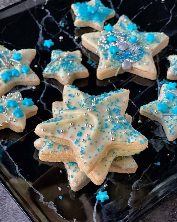 close-up shot of a single Starry Sea Shortbread cookie, showcasing the texture and glitter detail