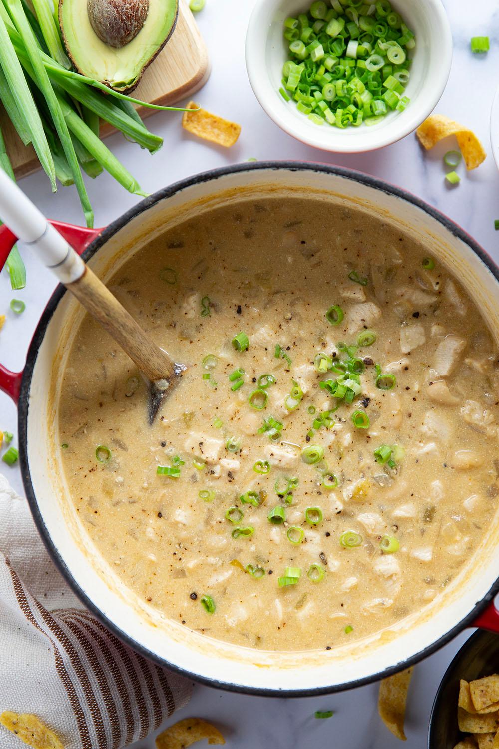 close up of white chicken chili in a pot