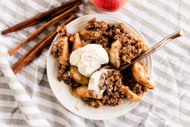 rustic dutch apple crisp on a wooden table