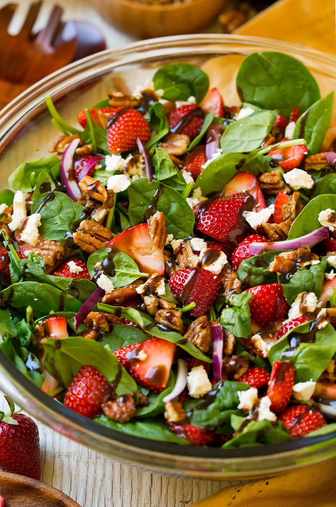 close-up shot of strawberry feta salad with balsamic drizzle